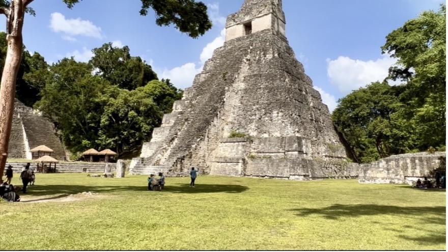 Visitors to Tikal National Park experience Temple III